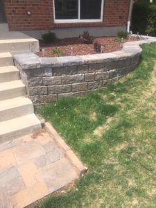 Small retaining wall for boxwood plantings